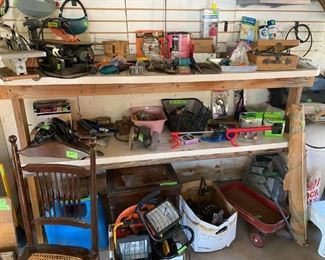 Tools, gadgets, child's wagon, work lights, kerosene container (full).