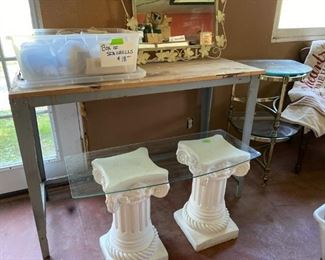 Work table, sea shells, mirror, pedestals with glass top table, brass side tables with glass tops