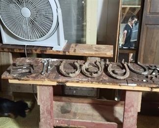 Vintage horse shoes and sawhorses 