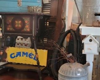 Shutters,  vintage camel sign, watering can, and so much more. these items will be in garage!!