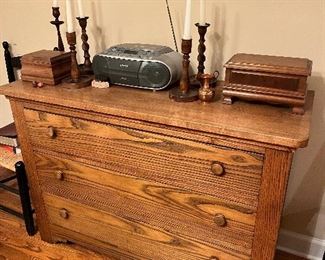 Beautiful chest with handmade boxes and candle sticks on top