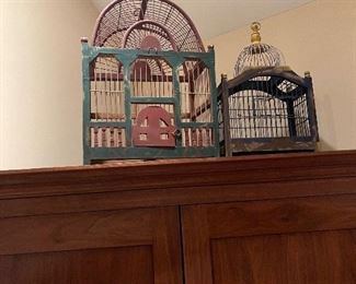 Several bird cages throughout the home