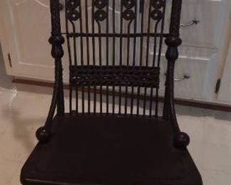 Dark Brown Wicker Chair with Scroll detailing