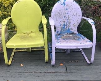 vintage mid-century bounce back chairs
