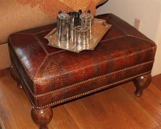 Richard Charles stamped ottoman with wood legs