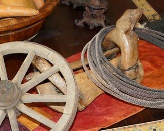 Vintage wood saddle, wheel & roping