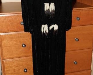 Evening dress with genuine fur adornment