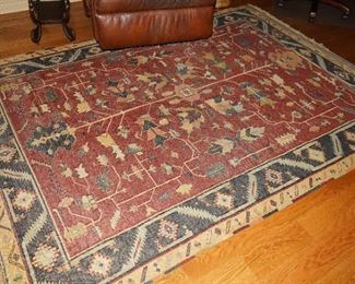 Woven southwestern floor rug