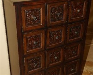 Ornate multi-drawer decorative cabinet