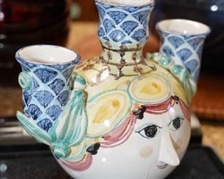 From Denmark comes this 3 spout face vase 