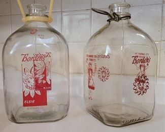 2 of several milk jugs