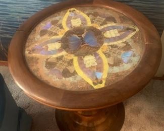 Antique table rare/with butterfly wing glass top $150.00
