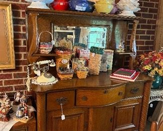 Antique hutch and  Longaberger baskets 