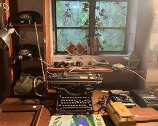 Antique Underwood typewriter and vintage phones 
