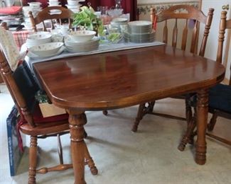 Nice Solid wood table with 3 leaves & 6 chairs