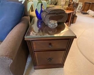 Side table with glass top and storage