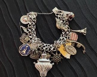 Sterling silver bracelet with mix of charms