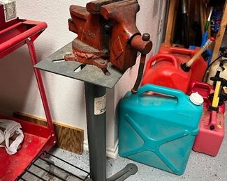 bench vise, gas cans