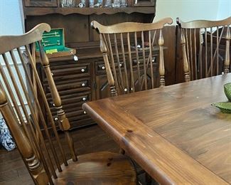 Dining table with two leaves; eight Windsor chairs, including six side and two arm chairs