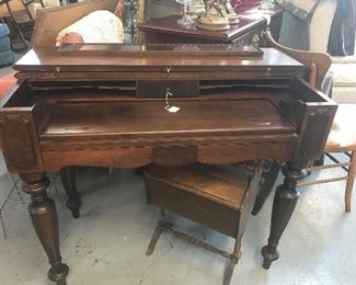 Nice walnut desk....desk pulls out, cubby holes and side compartment. Top folds down