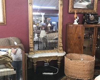 Incredible Neo Classical Entry Hall Mirror. 90"X36". Sits on marble top wall base. Beautiful condition. Love the Art Deco cabinet sitting to the side.