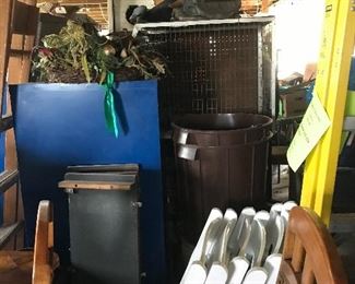 Love these white folding chairs, animal crate, filing cabinet duck decoys etc.