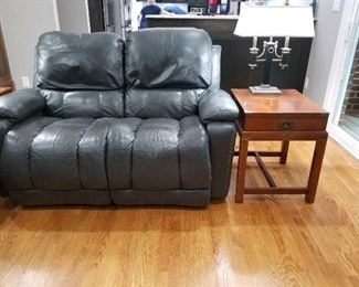 Leather reclining loveseat
