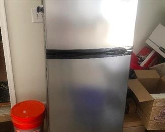 one-eyed fridge with a straight face