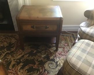 Suitcase/trunk style table.