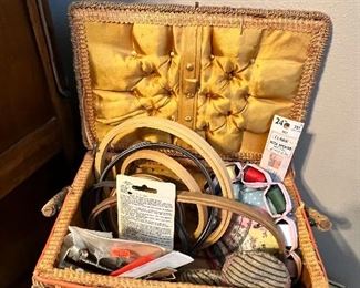 Vintage sewing basket full of sewing supplies 
