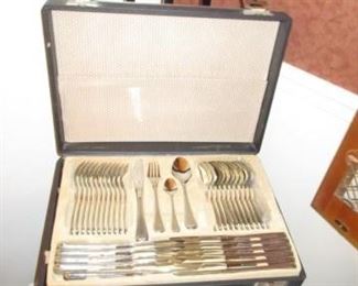 Stainless Flatware set in case.  Missing 1 Tablespoon.