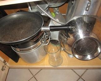 The kitchen is filled with THE BEST pots and pans