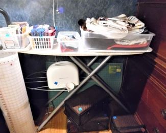 Lots of notions, ironing boards, cutting mats, and smaller pieces for those wonderful crazy quilts