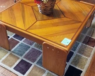 Handmade inlaid wood coffee table; brown/tan/neutral rug 6' x 4'