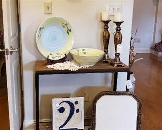 Metal and wood table, pottery, accessories