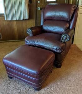 Hancock and Moore Leather Armchair and Ottoman. A beautiful burgundy set that looks to be in great condition with some light wear.

The chair measures 34” wide, 33” deep, 17” high to the seat and 38” high to the chair back