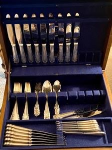 Georg Jensen Lilly of The Valley Sterling Silver Flatware Set - Gorgeous! 

9 dinner forks
8 salad forks
9 dessert forks
8 table/soup spoons
9 teaspoons
6 spreaders
Weight of about 2,078.43 grams not including the dinner or butter knive handles. 