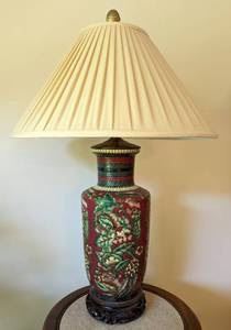 Lovely Asian Ceramic Table Lamp with Ornate Wood Base. Measures 37” high and 8” wide at the base.