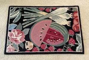 Vintage Hooked Accent Rug. Adorable watermelon and berries! There is some wear on the back of the rug that can be seen in the photos. Measures 24” x 36”