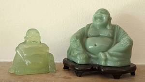 Pair of Carved Stone Buddha Figurines. The largest measures 4.5” high and 5” wide.