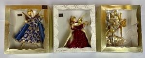 3 Koestel Wax Angel Ornaments made in West Germany. The largest adorable ornament measures 7 inches tall.v