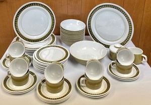 This Mikasa "Mediterrania" Dishware Set includes 7 dinner plates, 10 salad/dessert plates, 11 bowls, 10 cups, 10 saucers and serving pieces. 