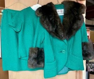 Vintage Wender's 3 Piece Fur Accented Suit. In the photos this 3 piece suit looks to be teal but it is kelly green. There is no size or kind of fur indicated. It looks to be a size 2-6 but this cannot be confirmed. 