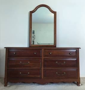 Drexel Heritage Mirrored Dresser. There are some light scratches but in overall great condition. Measures 68” wide, 19” deep and 80” high.