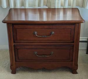 Drexel Heritage Nightstand. There are some light scratches, but in otherwise excellent condition. Measures 31.5” x 17” and 25” high