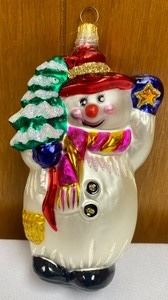 Christopher Radko Snowman Ornament measures 5.5 inches tall
