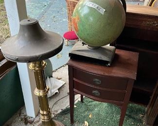 Light, globe, and wood side table