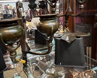Unique finds including Tiffany Studios candleholders and paperweight, each priced separately. 
