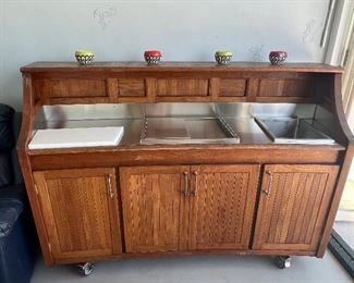 Teak wood bar with stainless sink, ice box,  and counters - lots of storage!