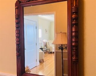 Carved mahogany mirror